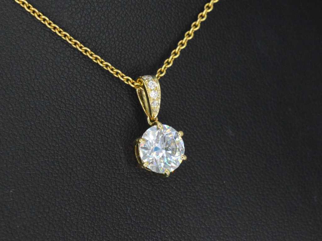 Gold solitaire pendant with a diamond of 1.50 carat