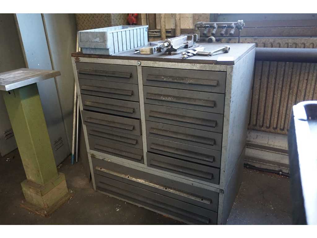 Drawer cabinet with drill equipment