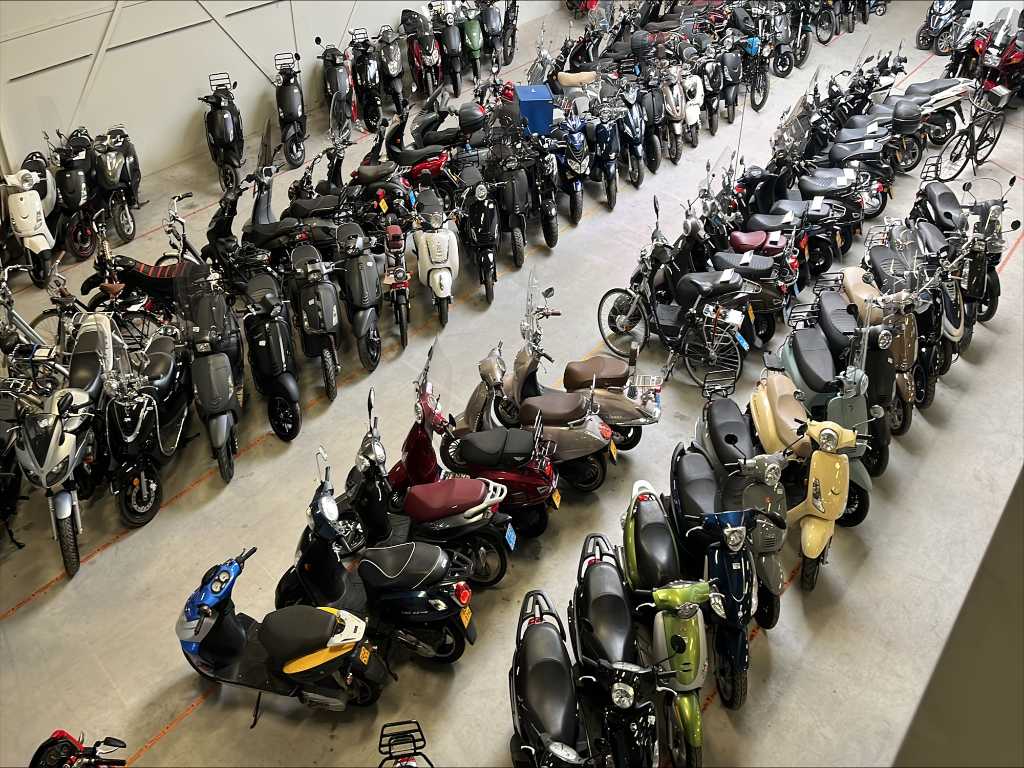 Collector's auction motorcycles and scooters