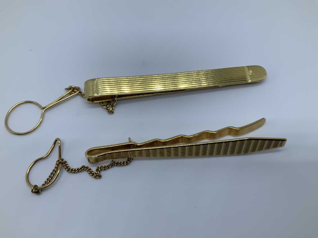 Two tie pins