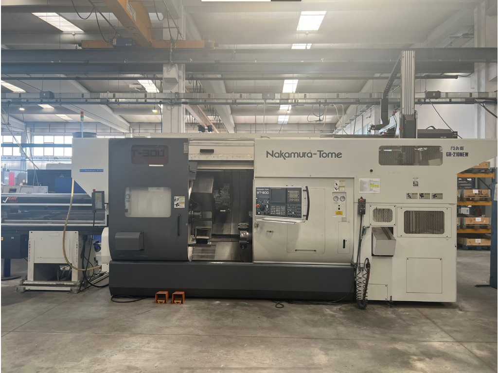 Nakamura-Tome WT-300 GR-210NEW CNC lathe with bar feeder and multi layer work stocker