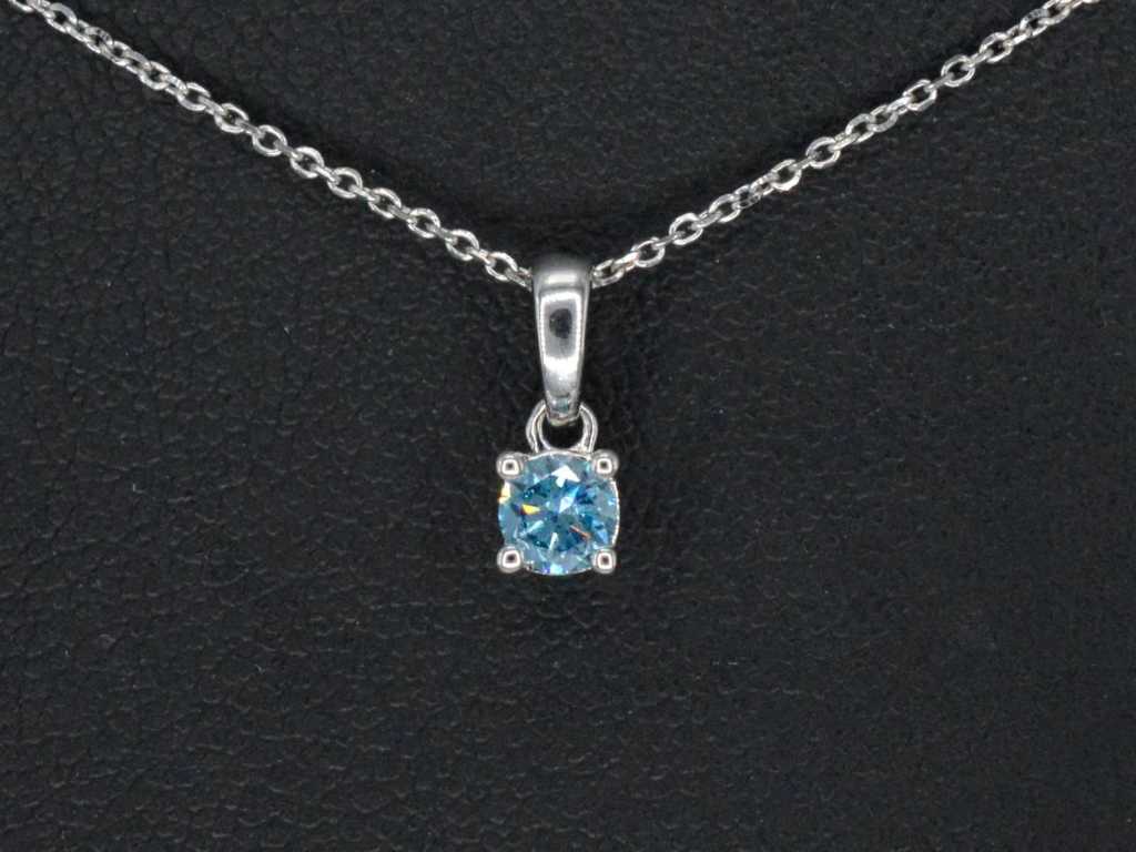White gold necklace with a blue diamond 0.25 carat
