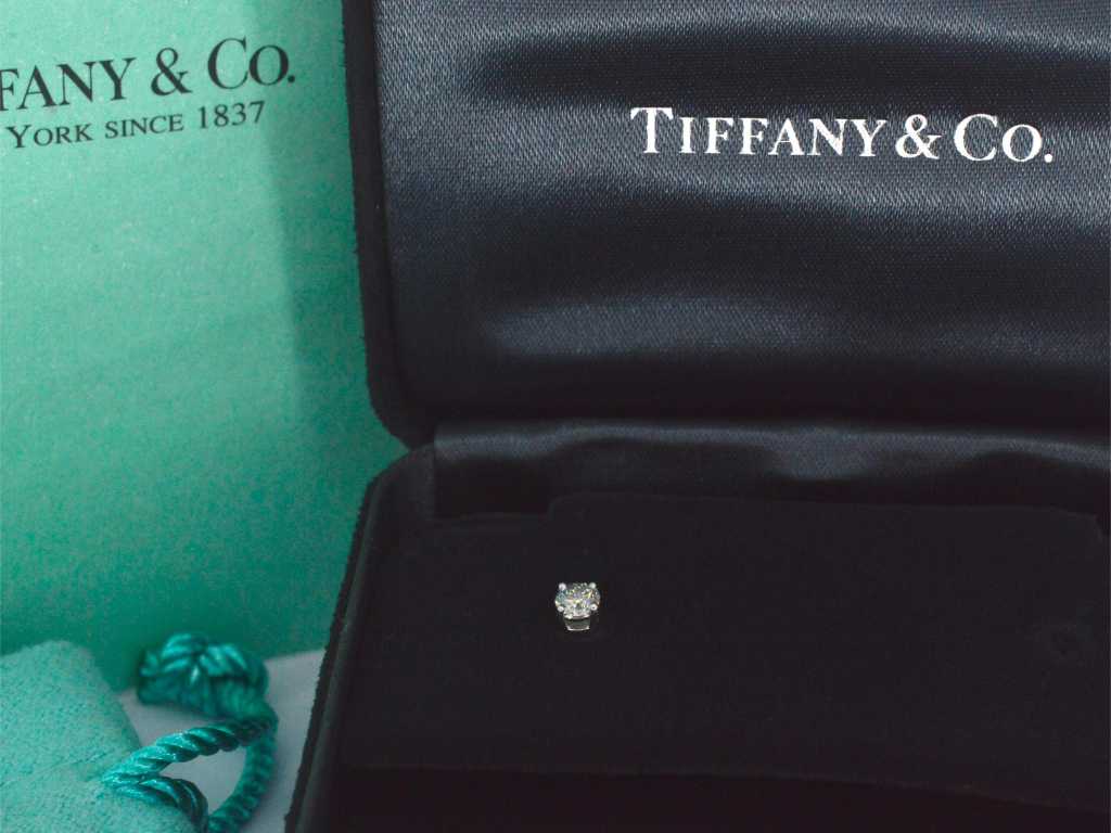 Tiffany & Co - Tiffany solitair oorknop met diamant
