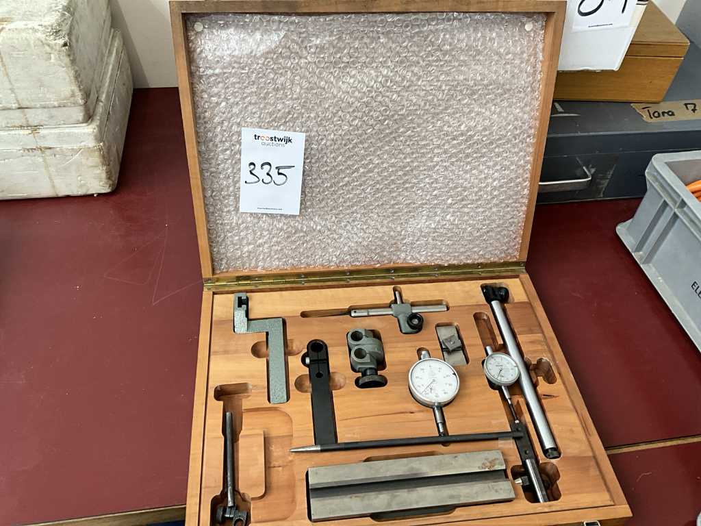 Dial gauge with universal holder